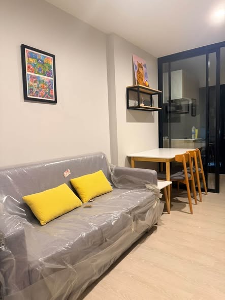 bedroom and living room of NUE Connex Condo Don Mueang