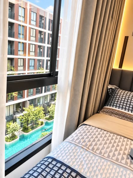 bedroom of Nue Cross Khu Khot Station (นิว ครอส คูคต สเตชัน)