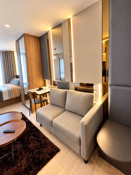 living room and bedroom of Nue Cross Khu Khot Station (นิว ครอส คูคต สเตชัน)
