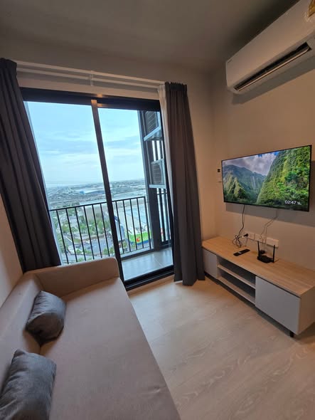 bedroom and living room of Nue Mega Plus Bangna