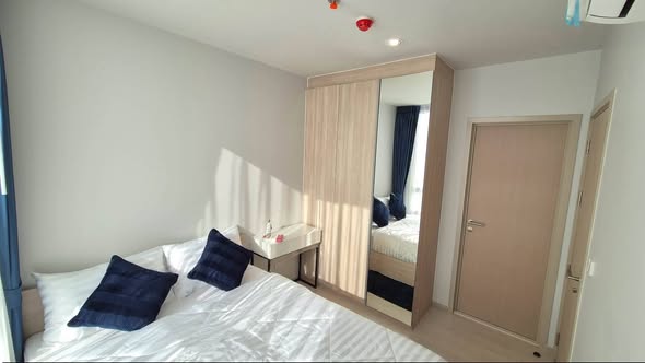 bedroom and room interior of Nue Mega Plus Bangna