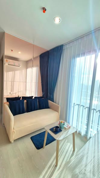living room and bedroom of Nue Mega Plus Bangna