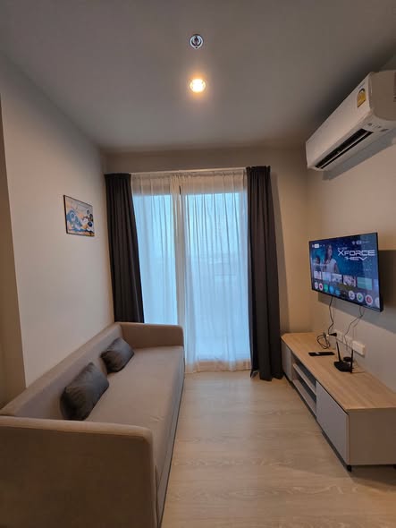 living room and bedroom of Nue Mega Plus Bangna