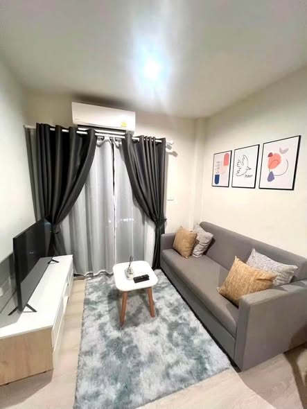bedroom and living room of NUE Noble Srinakarin Lasalle นิว โนเบิล ศรีนครินทร์ – ลาซาล