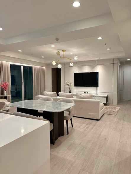 living room and kitchen of Nusasiri Grand Condo