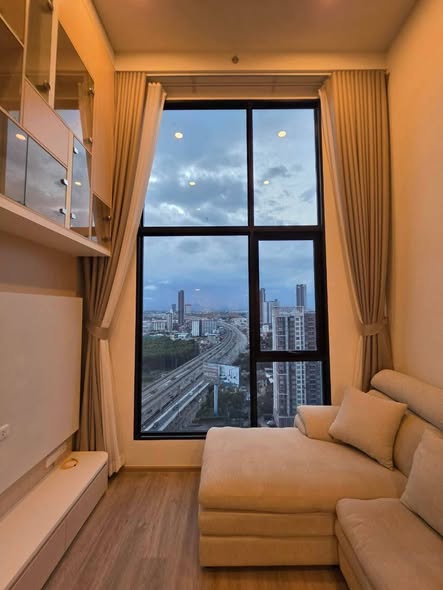 bedroom and living room of Origin Plug & Play Nonthaburi Station