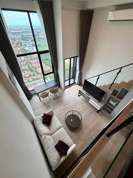 living room of Origin Plug & Play Nonthaburi Station