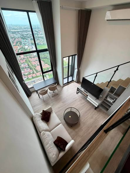 living room of Origin Plug & Play Nonthaburi Station
