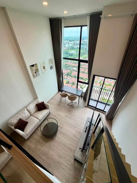 living room of Origin Plug & Play Nonthaburi Station
