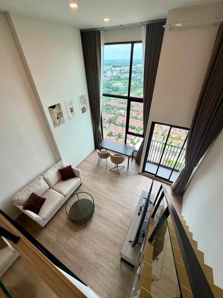 living room of Origin Plug & Play Nonthaburi Station