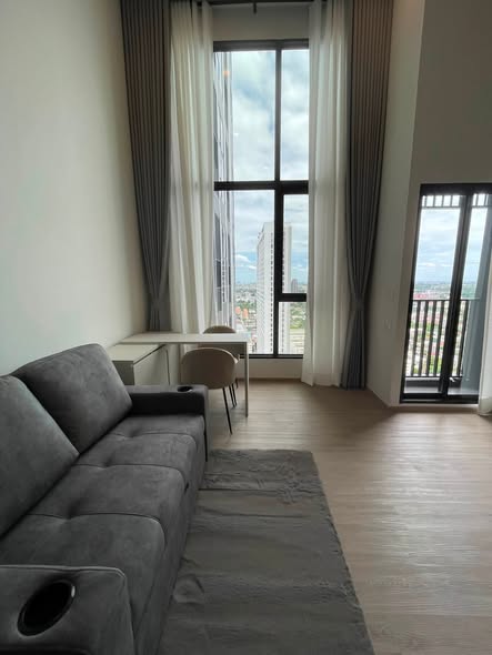 living room and bedroom of Origin Plug & Play Nonthaburi Station