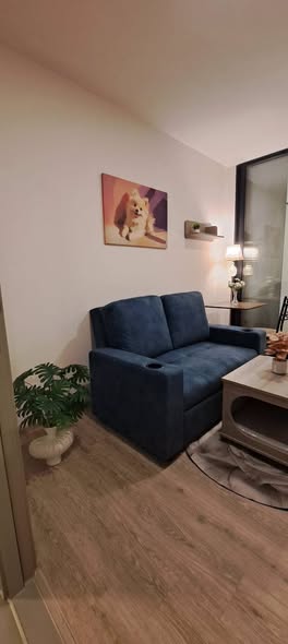 living room of Origin Plug & Play Sirindhorn Station