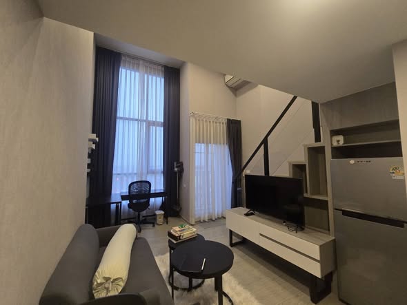 bedroom and living room of Origin Plug&Play Ramkhamhaeng Triple Station