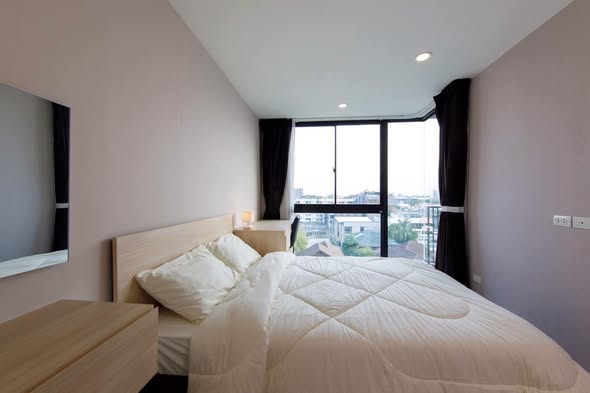 bedroom of Palm Springs Nimman Areca