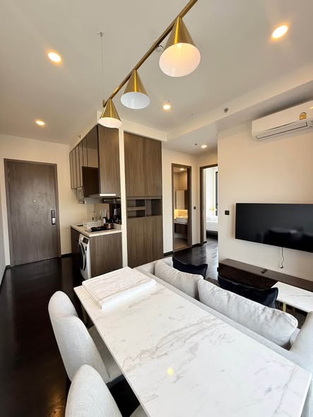 living room and kitchen of Park​ Origin​ Thonglor
