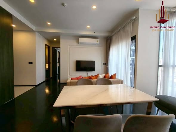 living room and kitchen of Park​ Origin​ Thonglor