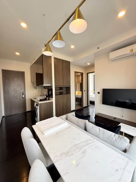 living room and kitchen of Park​ Origin​ Thonglor