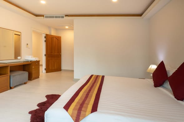 bedroom of PARKROYAL Suites Bangkok
