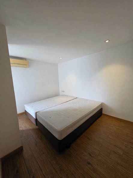 bedroom of Pentafield City Residence