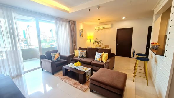 bedroom and living room of Piyathip Place Serviced Apartment