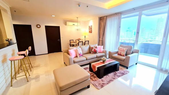 bedroom and living room of Piyathip Place Serviced Apartment