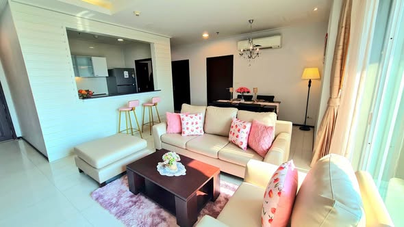 living room and bedroom of Piyathip Place Serviced Apartment