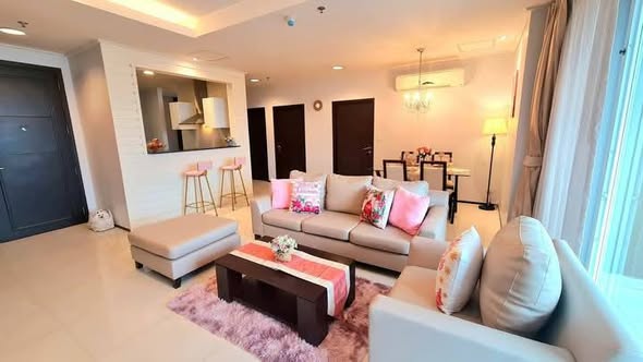 living room and bedroom of Piyathip Place Serviced Apartment