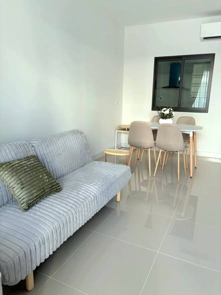 bedroom and living room of พลีโน่ สุขุมวิท-บางนา Pleno Sukhumvit-Bangna