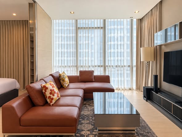 living room and bedroom of Prime Mansion One