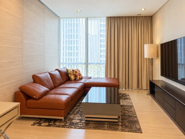 living room and bedroom of Prime Mansion One