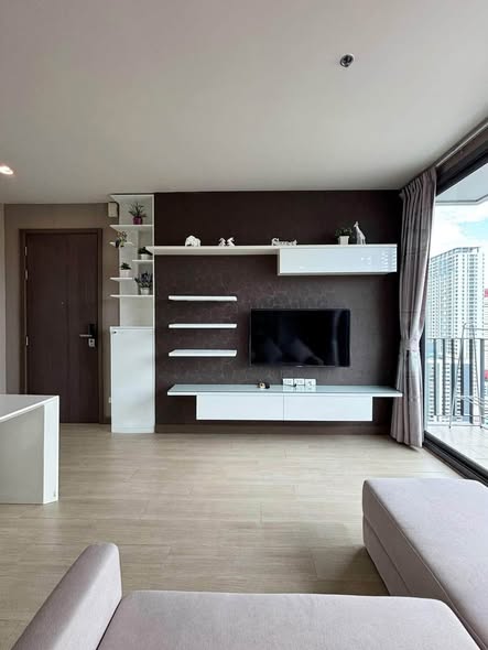 living room and bedroom of Pyne by Sansiri