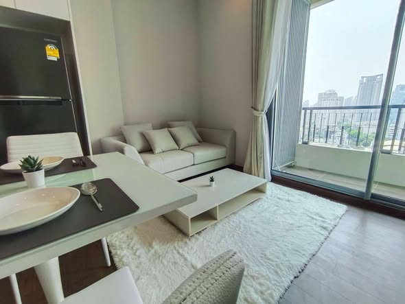 bedroom and living room of Q Asoke