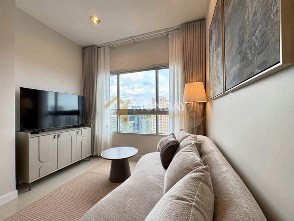 bedroom and living room of Q House Condo Sathon