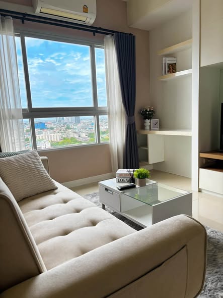 bedroom and living room of Q House Condo Sathon