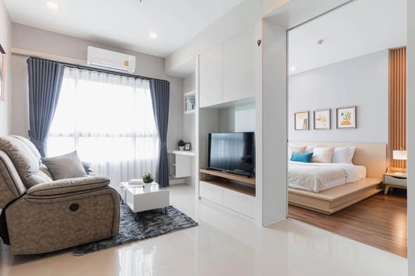 living room and bedroom of Q House Condo Sathon