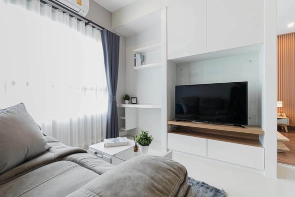 living room and bedroom of Q House Condo Sathon