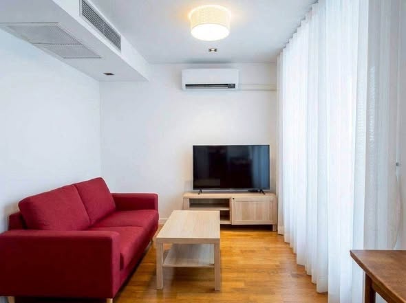 bedroom and living room and room interior of Quad Silom condominium