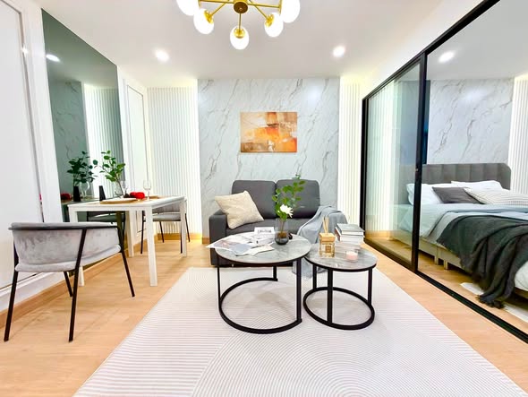bedroom and living room of Ratchada Resort Condo