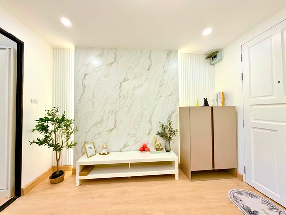 living room and bathroom of Ratchada Resort Condo