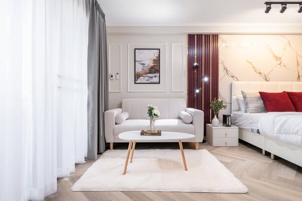 living room and bedroom of Regent Srinagarindra Tower