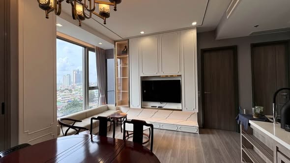 living room and kitchen of Rhythm Charoenkrung Pavillion