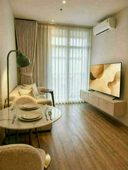 bedroom and living room of Rhythm Ekkamai Estate