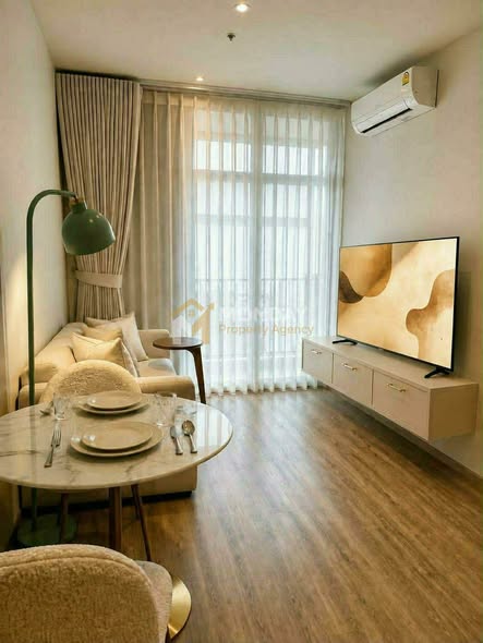 bedroom and living room of Rhythm Ekkamai Estate