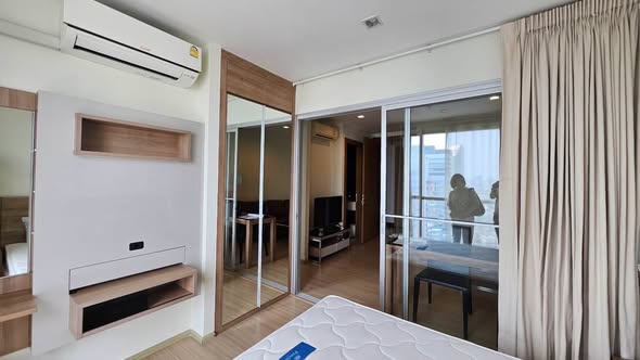 bedroom of RHYTHM Ratchada-Huaykwang
