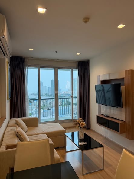 bedroom and living room of RHYTHM Sathorn