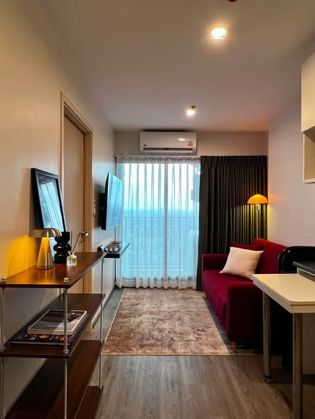bedroom and living room of Rich Park Triple Station