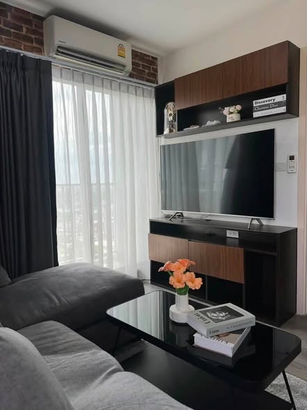 living room and bedroom of Rich Park Triple Station