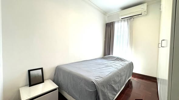 bedroom of Richmond Palace Condominium