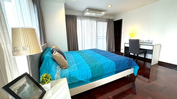 bedroom of Richmond Palace Condominium