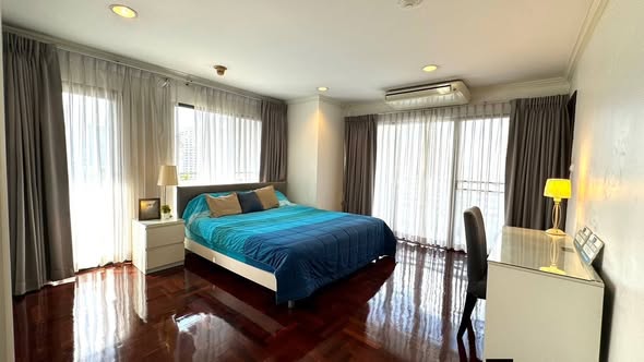 bedroom of Richmond Palace Condominium